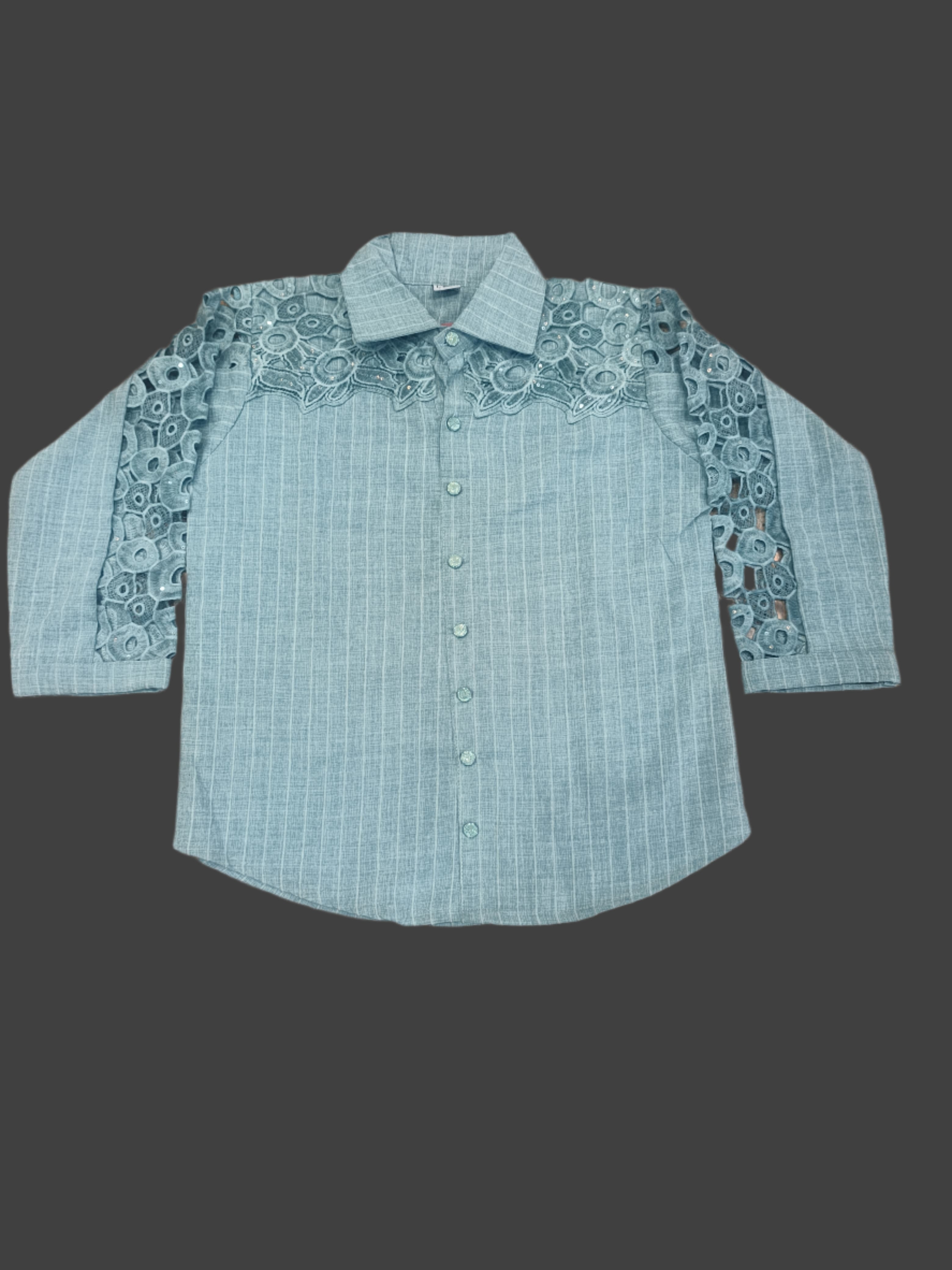 Blue shirt with lace details on a marble floor