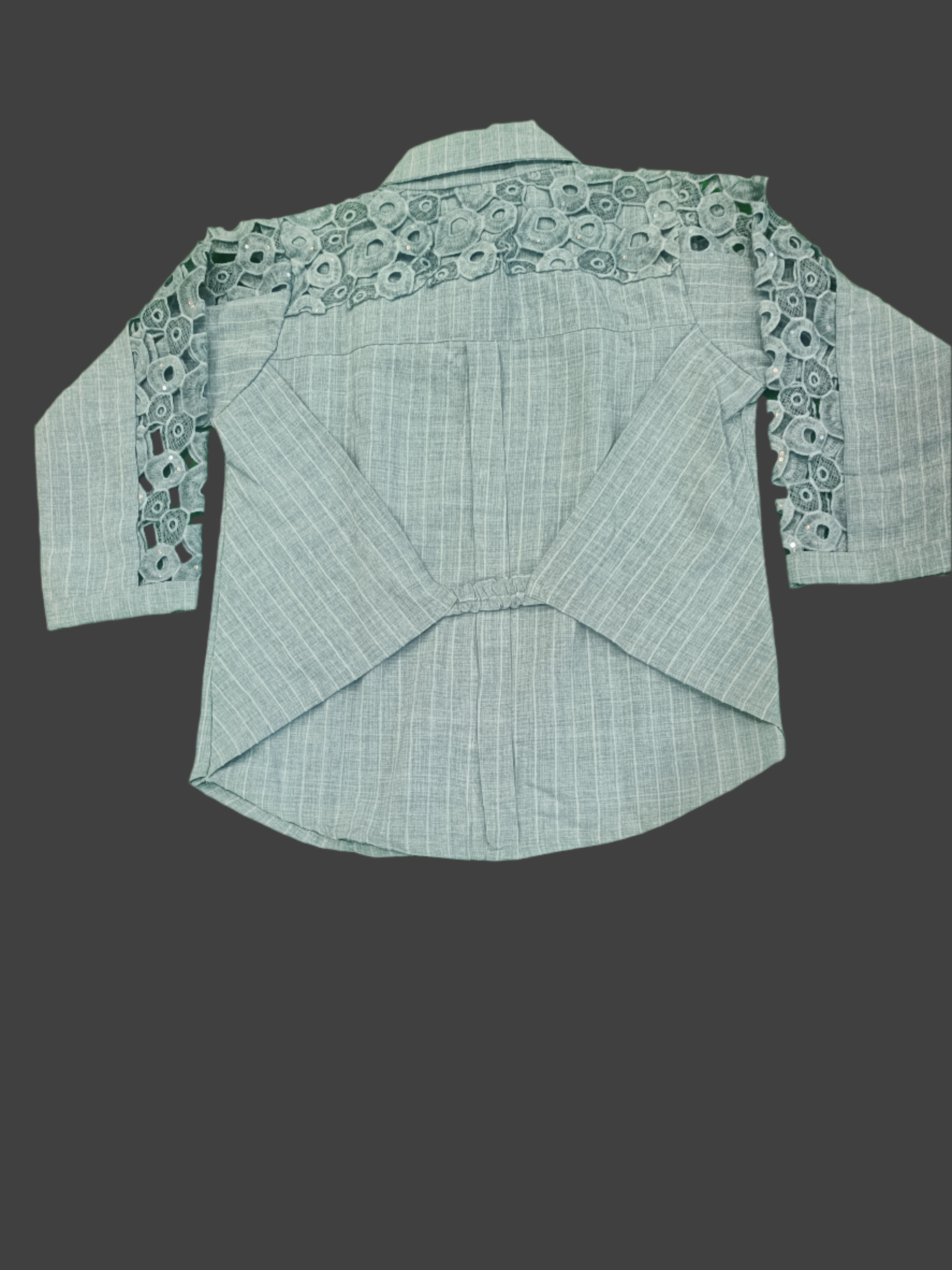 Fabric with geometric pattern on a green background