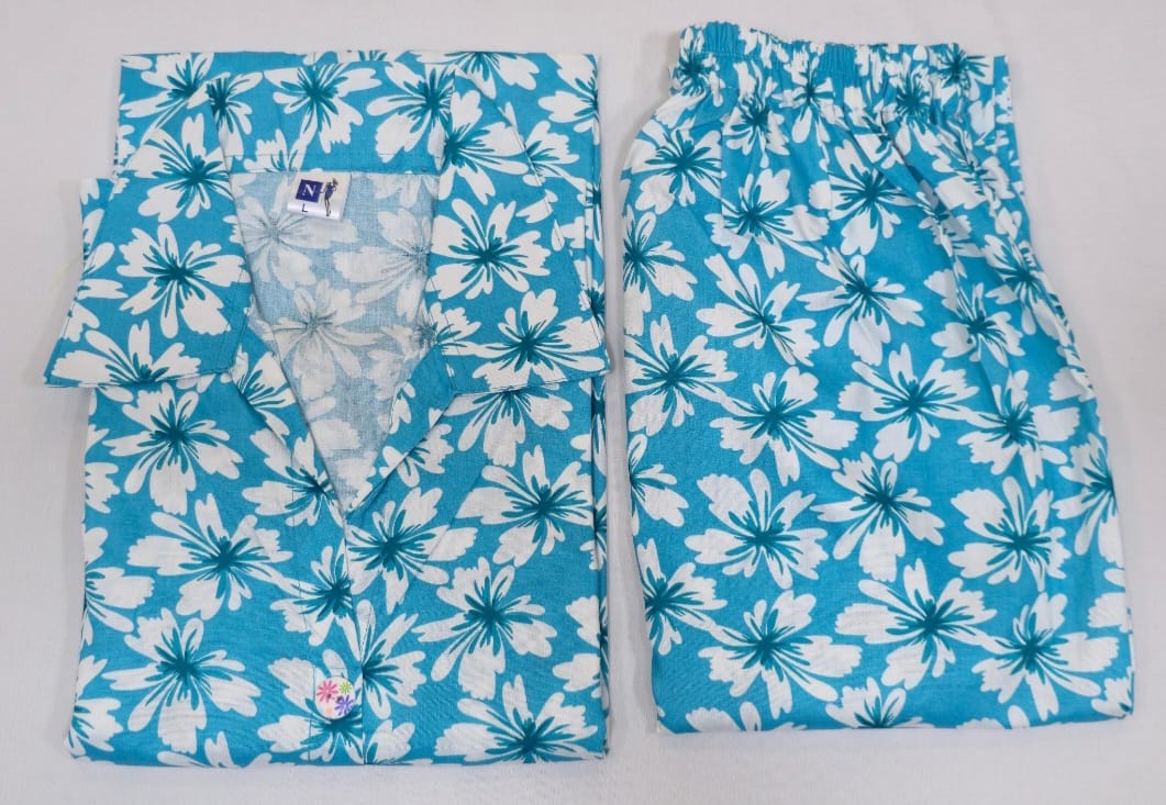 Blue floral pajama set on a light gray background